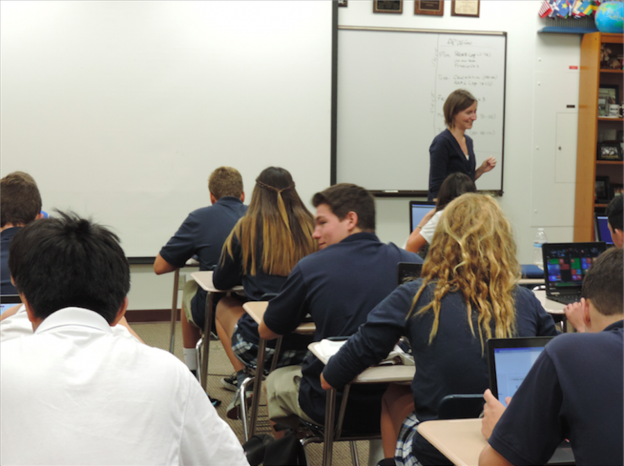New English teacher Katie Folkrod lectures during her seventh period English 3 class.