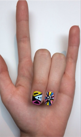 Boom clap - Scifres' vibrant nails show she's ready to rock 'n' roll.