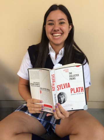 Smiles for Sylvia - Senior Olivia Shalhoup studiously reads Sylvia Plath during her lunch break. 