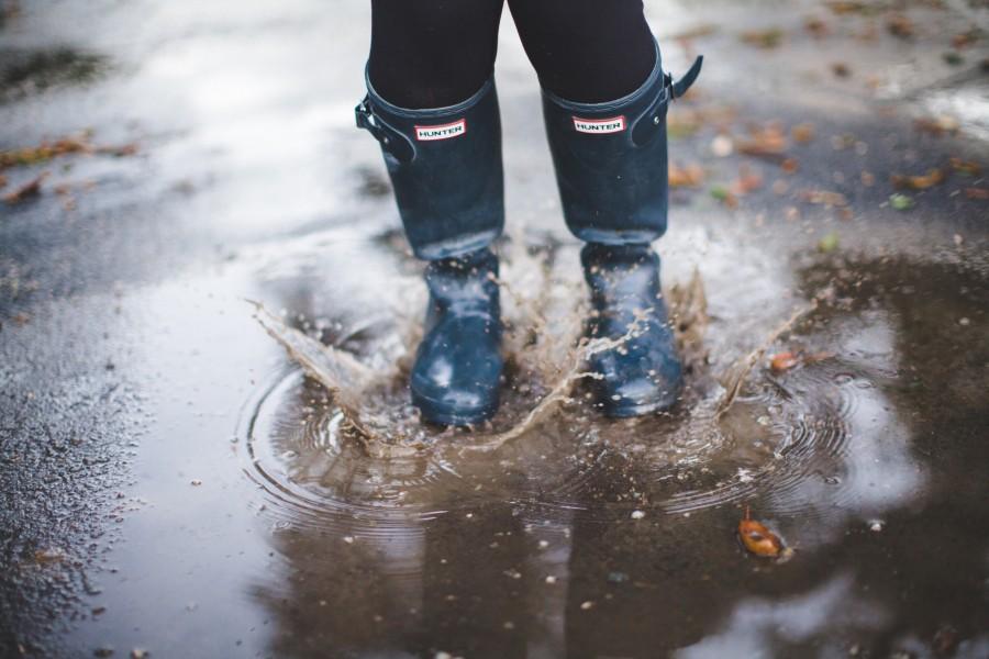 Splash - Junior Mickey Galvin jumps into a puddle with her Hunter rain boots.