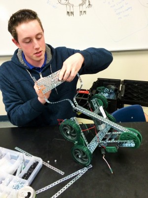 Little by little - Junior Mac Dalphy puts the finishing touches on his metal work.