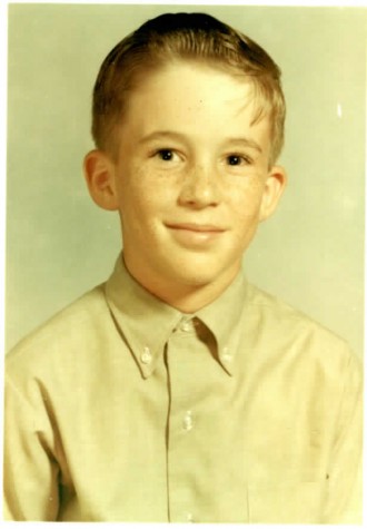 Gary Fox poses for his yearbook photo when he was in sixth grade.