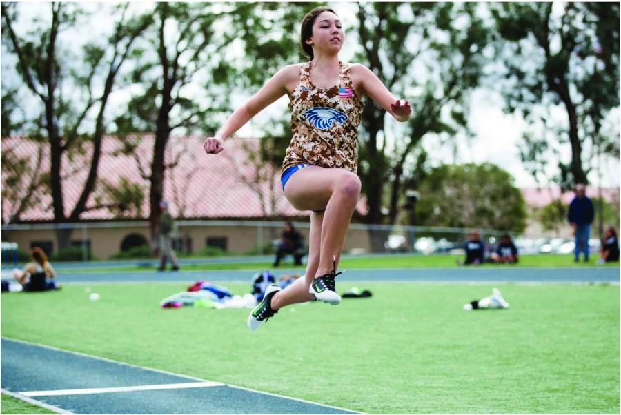 Jumping through the pain - At the Wounded Warrior Project, held at SMCHS, junior Katey Long progresses despite the burden of shin splints.