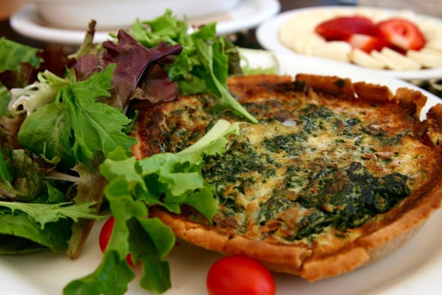 The spinach-mushroom quiche comes with a side of salad.
