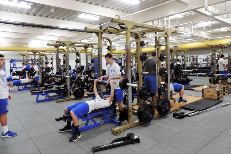 The SMCHS football team practices without a head coach during off season.