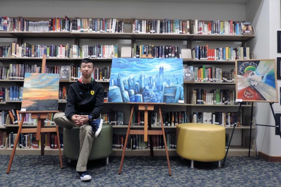 Senior Roland Pan showcases 10 works at this years art show, one of which is Memory (C), a monochromatic oil painting of his hometown Shenzhen, China.