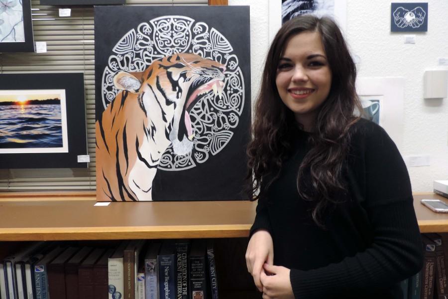 Senior Carola Strozzi incorporates her love for tigers and her exploration of art nouveau in this painting.