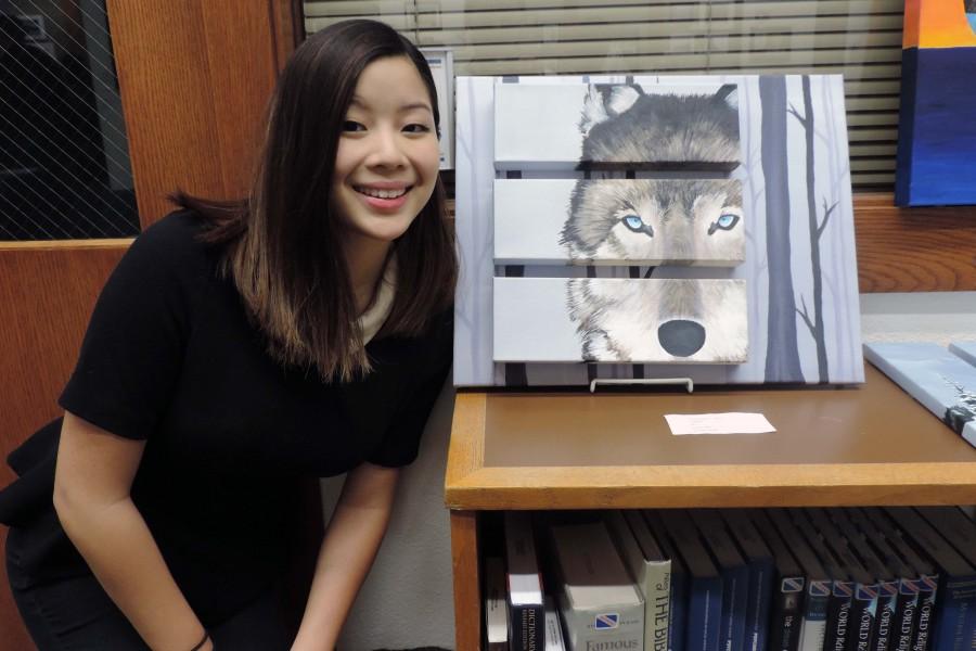 Senior Victoria Nguyen utilizes the altered scale technique to portray a wolf in the woods.