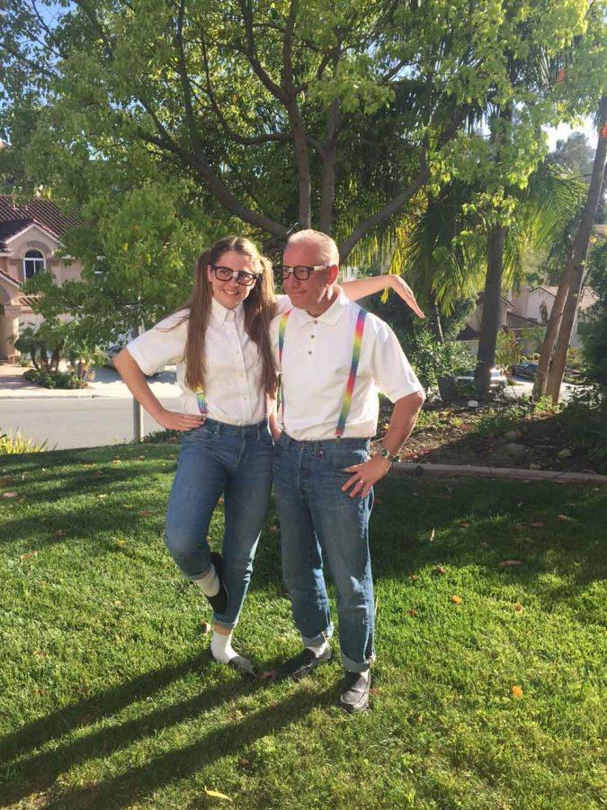 Dressed up in white shirts, rainbow suspenders and taped glasses, Sydney and her father were ready to show off their dance moves.