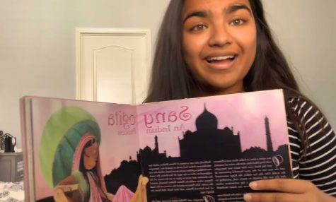 Surana gets ready to film her video reading a children's story. The videos have been sent to Team Long Run.