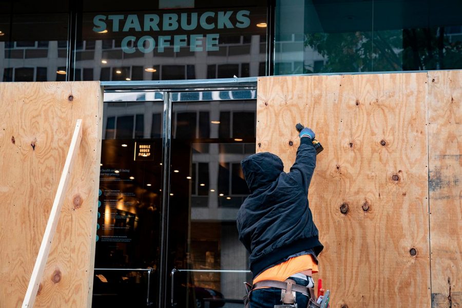 Store fronts are being boarded up in major cities in preparation for the election.