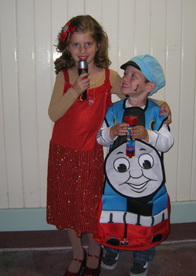 Johnson and her younger brother all dressed up and ready for a night full of receiving their favorite candies from houses around the block. 