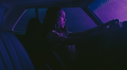 Rising star Olivia Rodrigo drives a car through the suburbs in a music video for her new single Drivers License. Traction gained from the singer-songwriters popularity on TikTok helped skyrocket the song to number one on global charts.